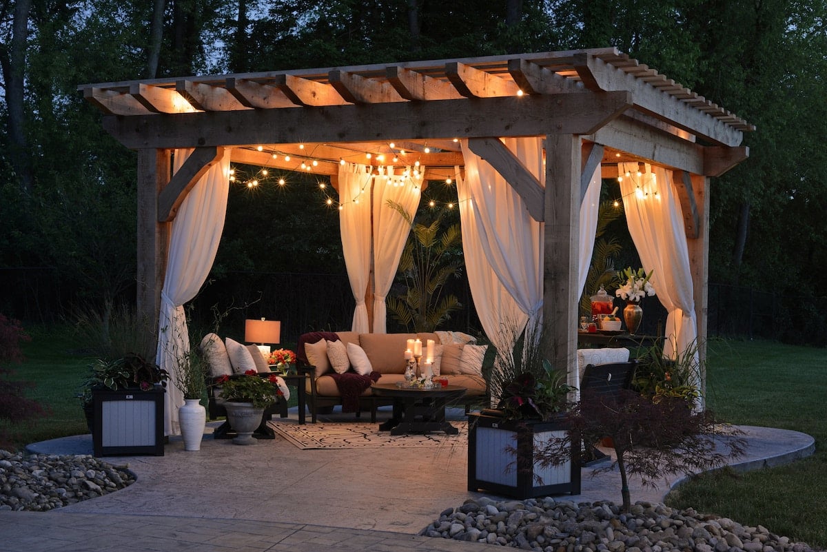 adding arbors and pergolas to add shade and interest in the garden